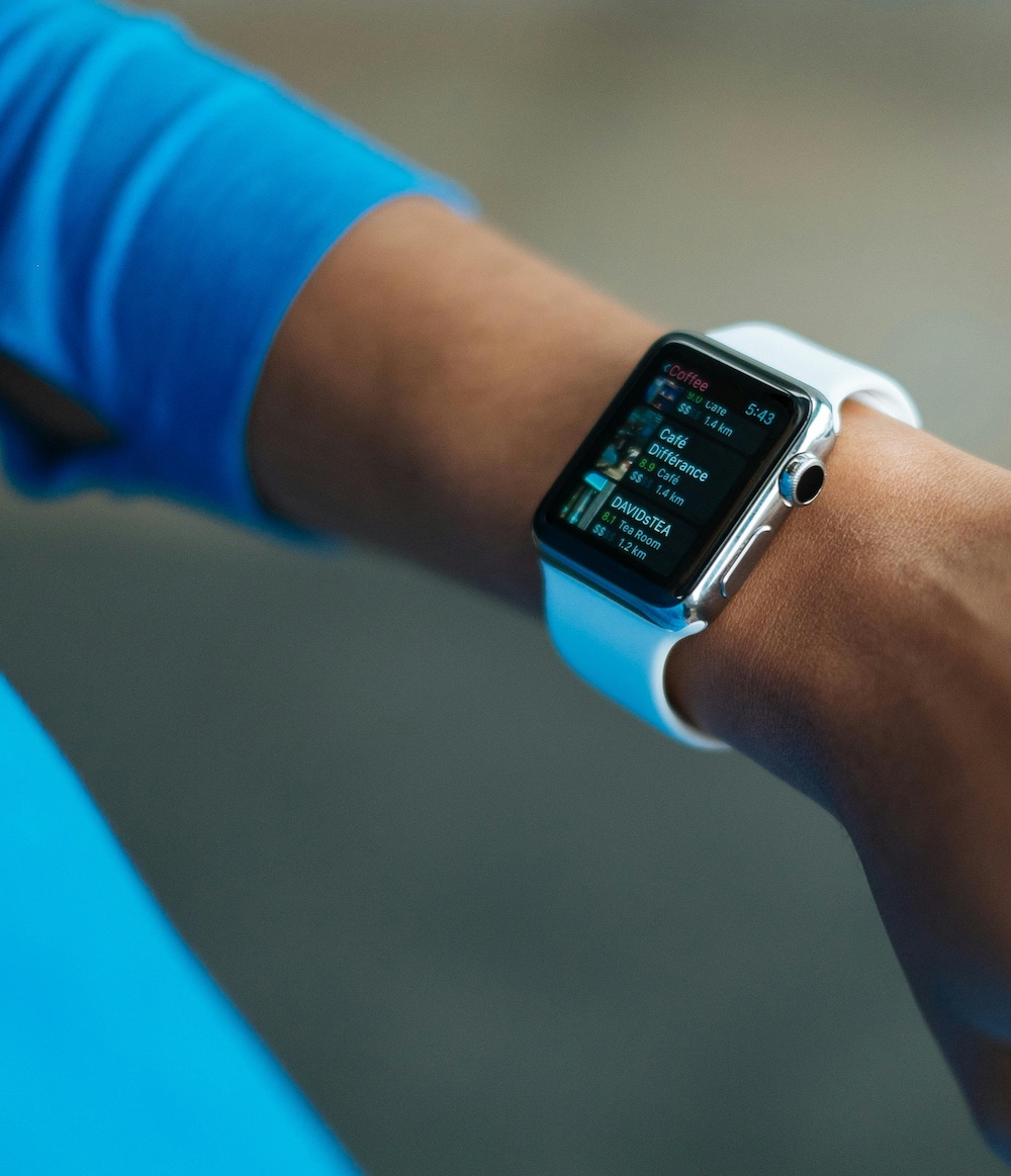 employees around the desk collaborating